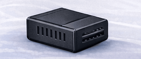 GPS360 Plus tracker — compact black hardware unit with side ventilation slots